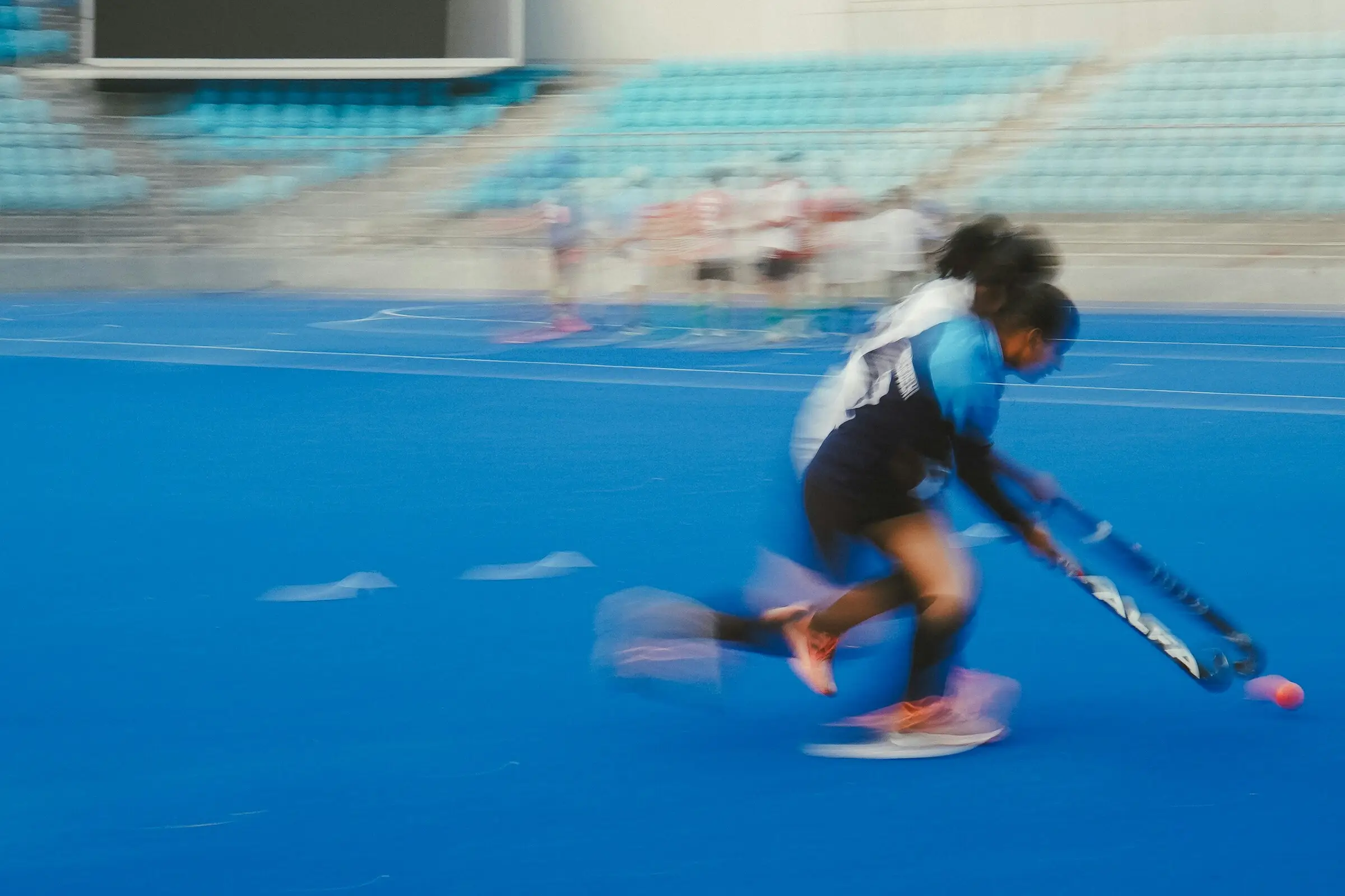 Hockey player in motion on the field